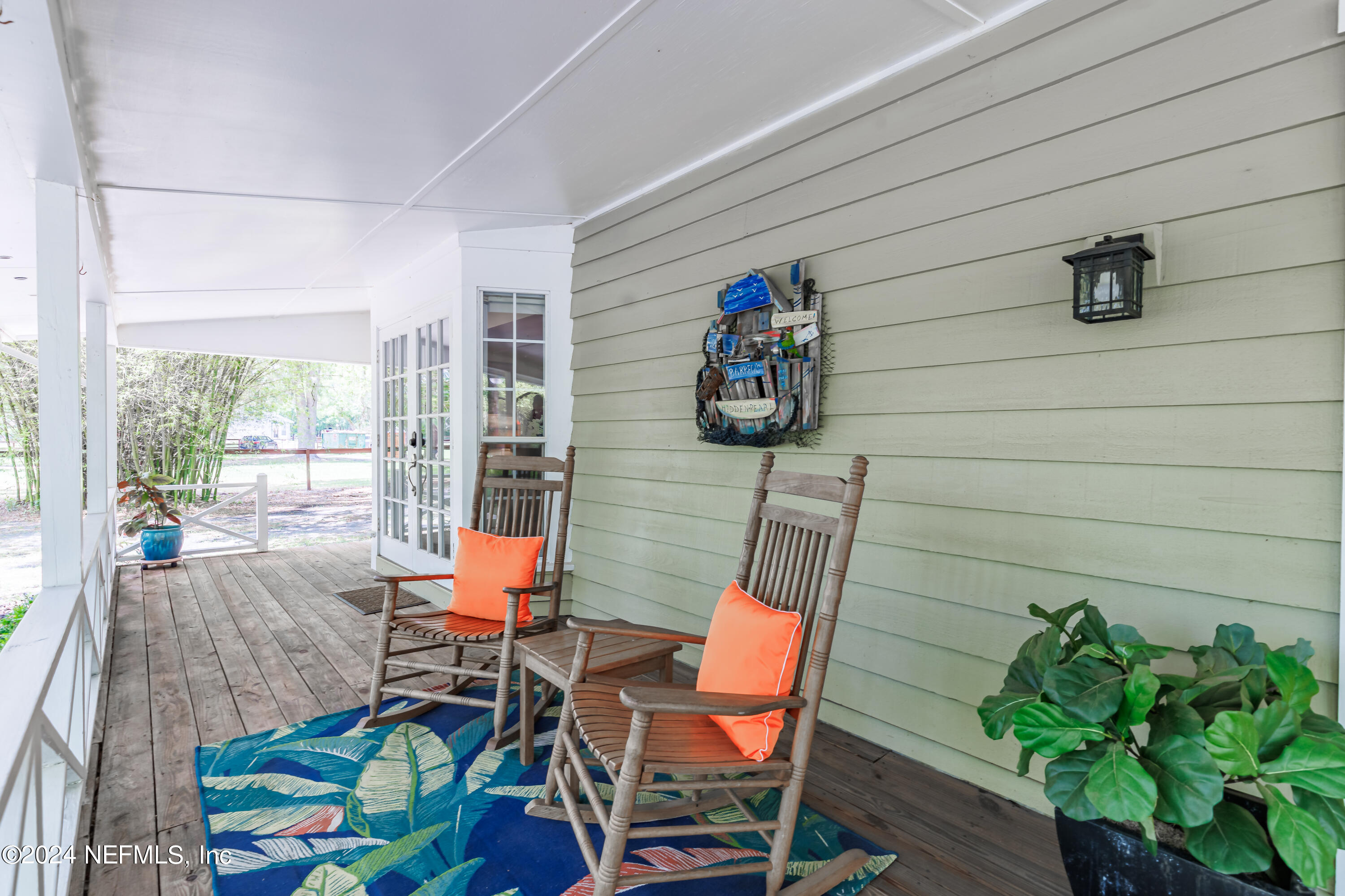 6070 Datil Pepper Road St. Augustine, FL 32086 - Photo 18 of 73 a outdoor living space with furniture and garden view