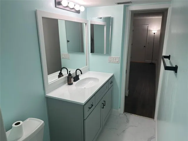 a view of entrance gate of a house