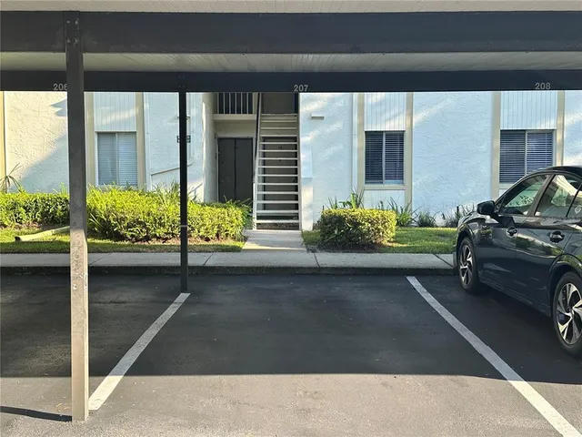 a cars parked in front of a building