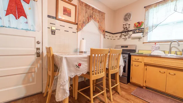 a view of a kitchen with appliances and cabinets