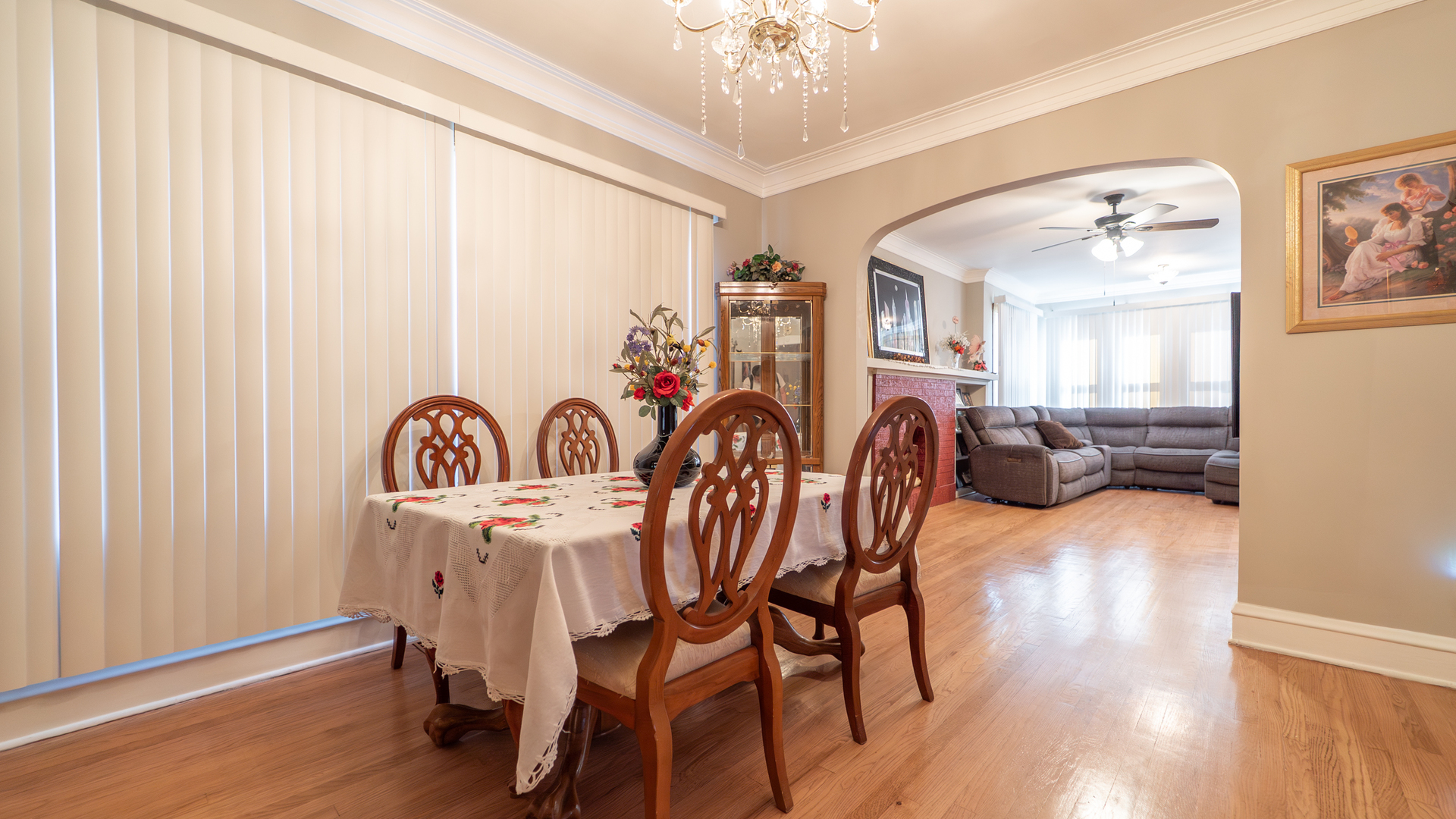 10613 South Ave F Chicago, IL 60617 - Photo 16 of 35 a dining room with furniture and wooden floor