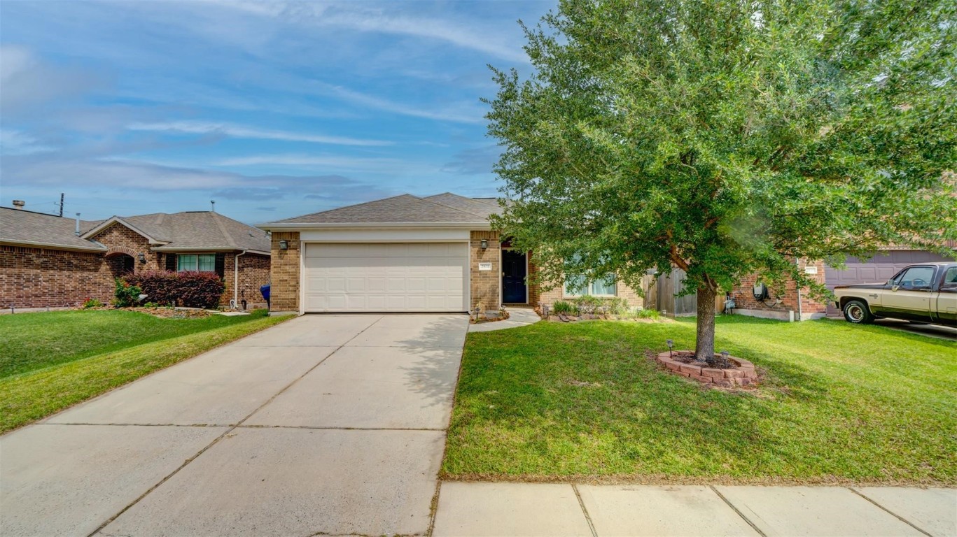2831 Lockeridge Bend Drive Spring, TX 77386 - Photo 16 of 16 a house view with a garden space