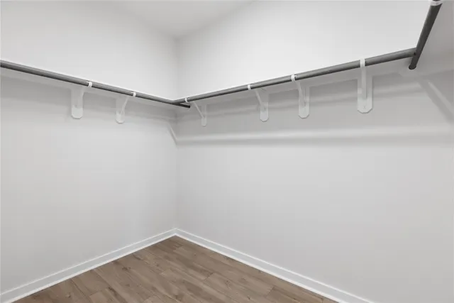 a view of a room with shelf on the wall