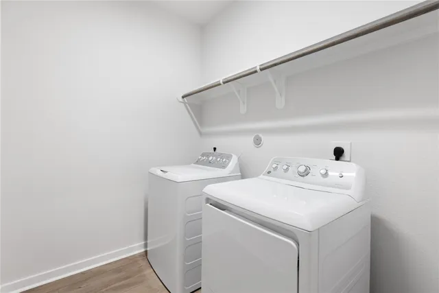 a utility room with dryer and washer