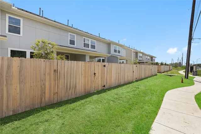 a view of a back yard of the house