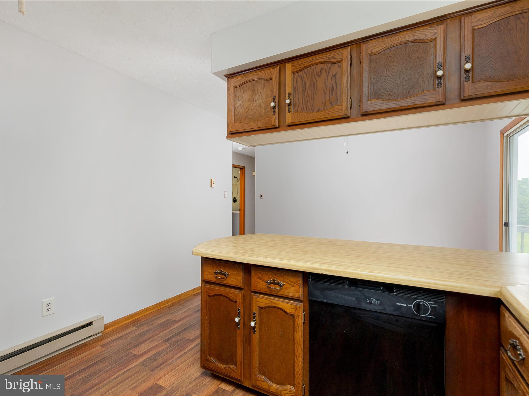 13970 Back Road Strasburg, VA 22657 - Photo 11 of 68 a utility room with wooden floor