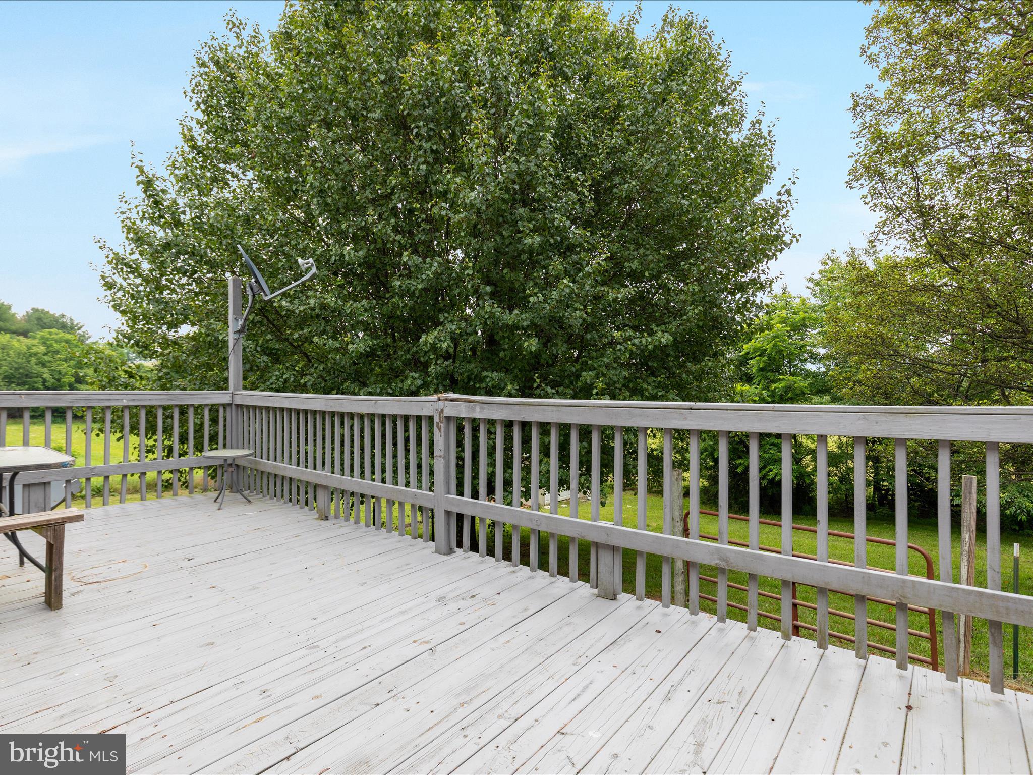 13970 Back Road Strasburg, VA 22657 - Photo 29 of 68 a view of balcony with wooden floor and fence