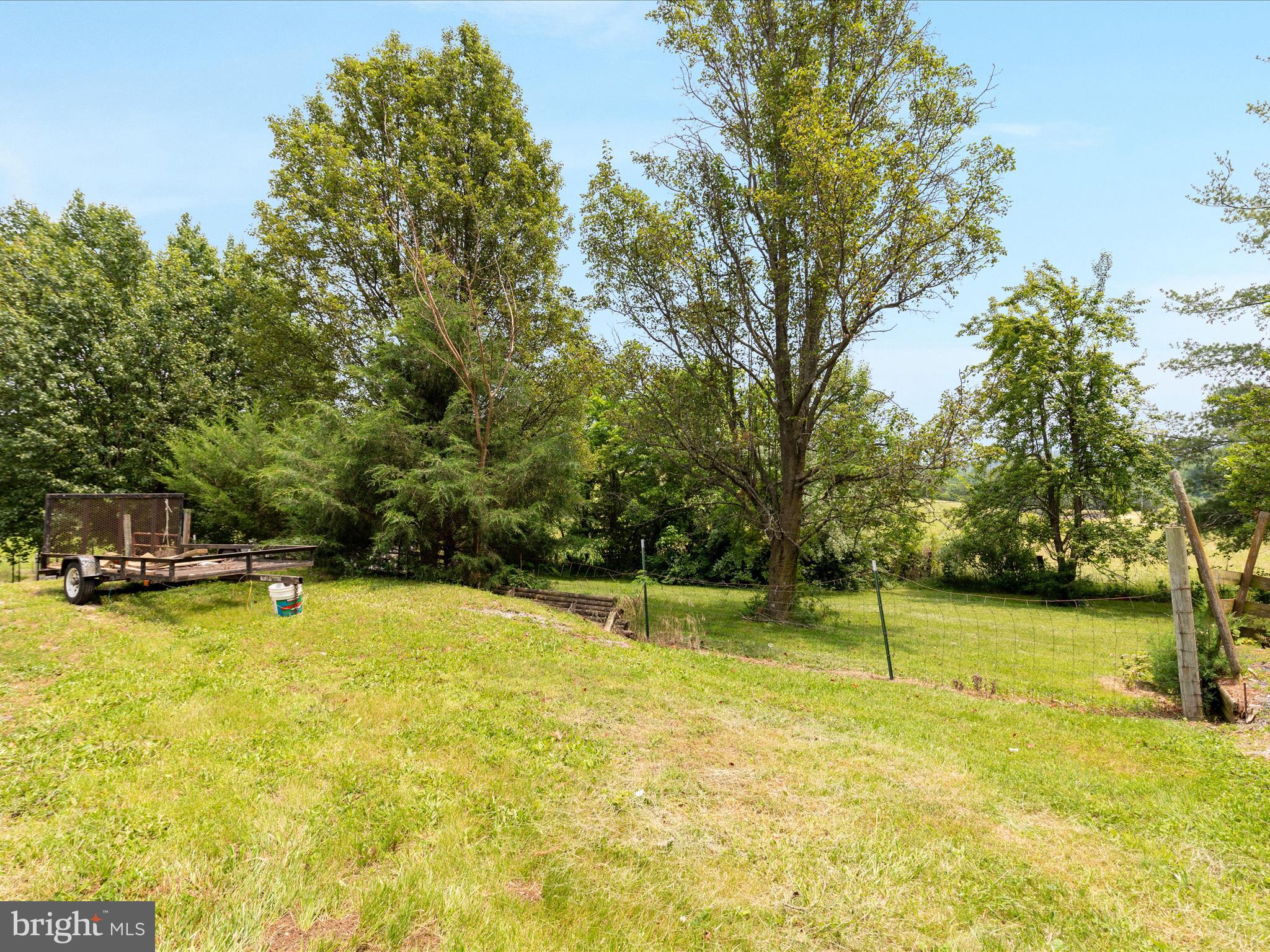 13970 Back Road Strasburg, VA 22657 - Photo 31 of 68 a view of a swimming pool with a yard