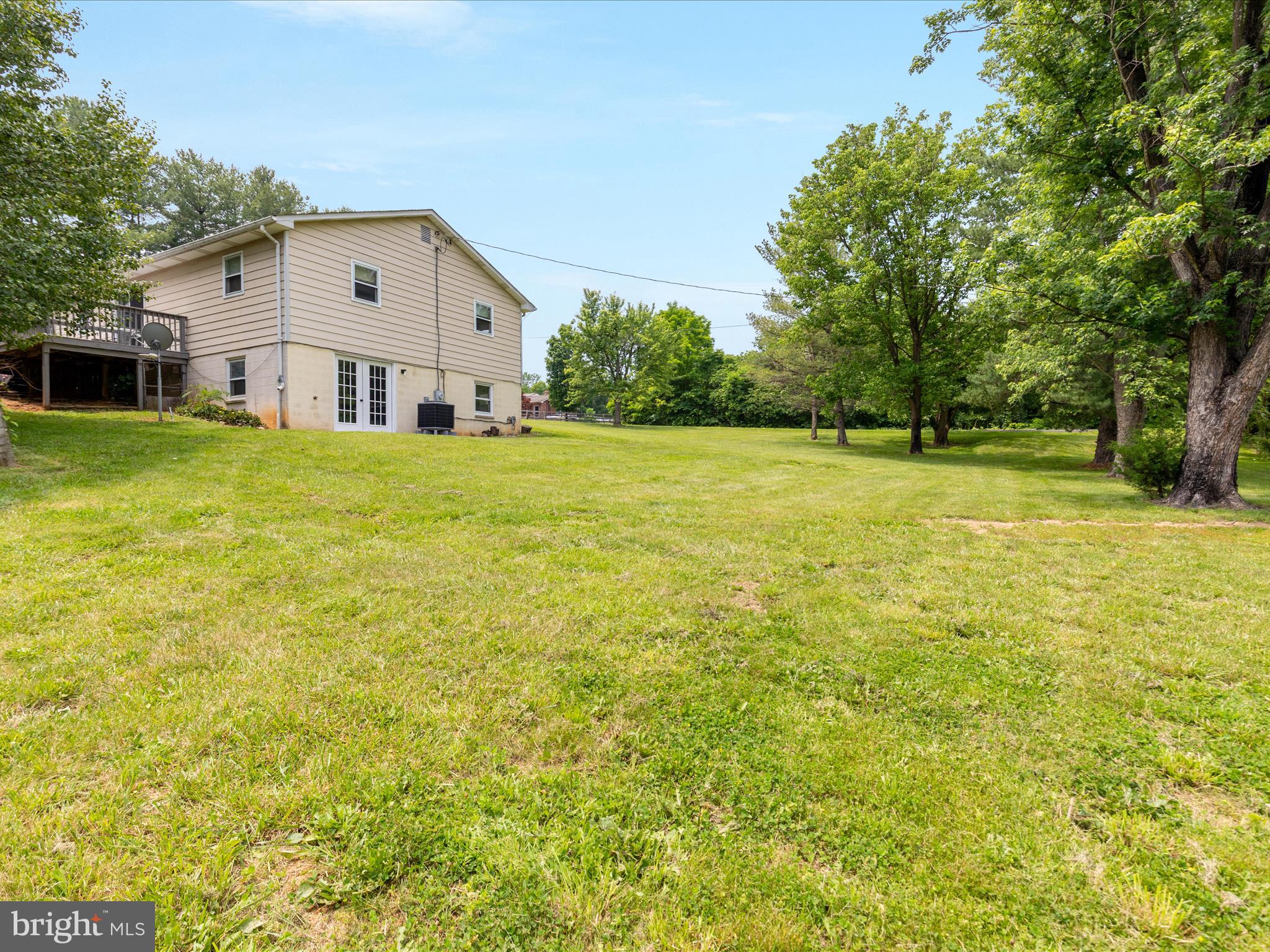 13970 Back Road Strasburg, VA 22657 - Photo 32 of 68 a view of a house with a yard