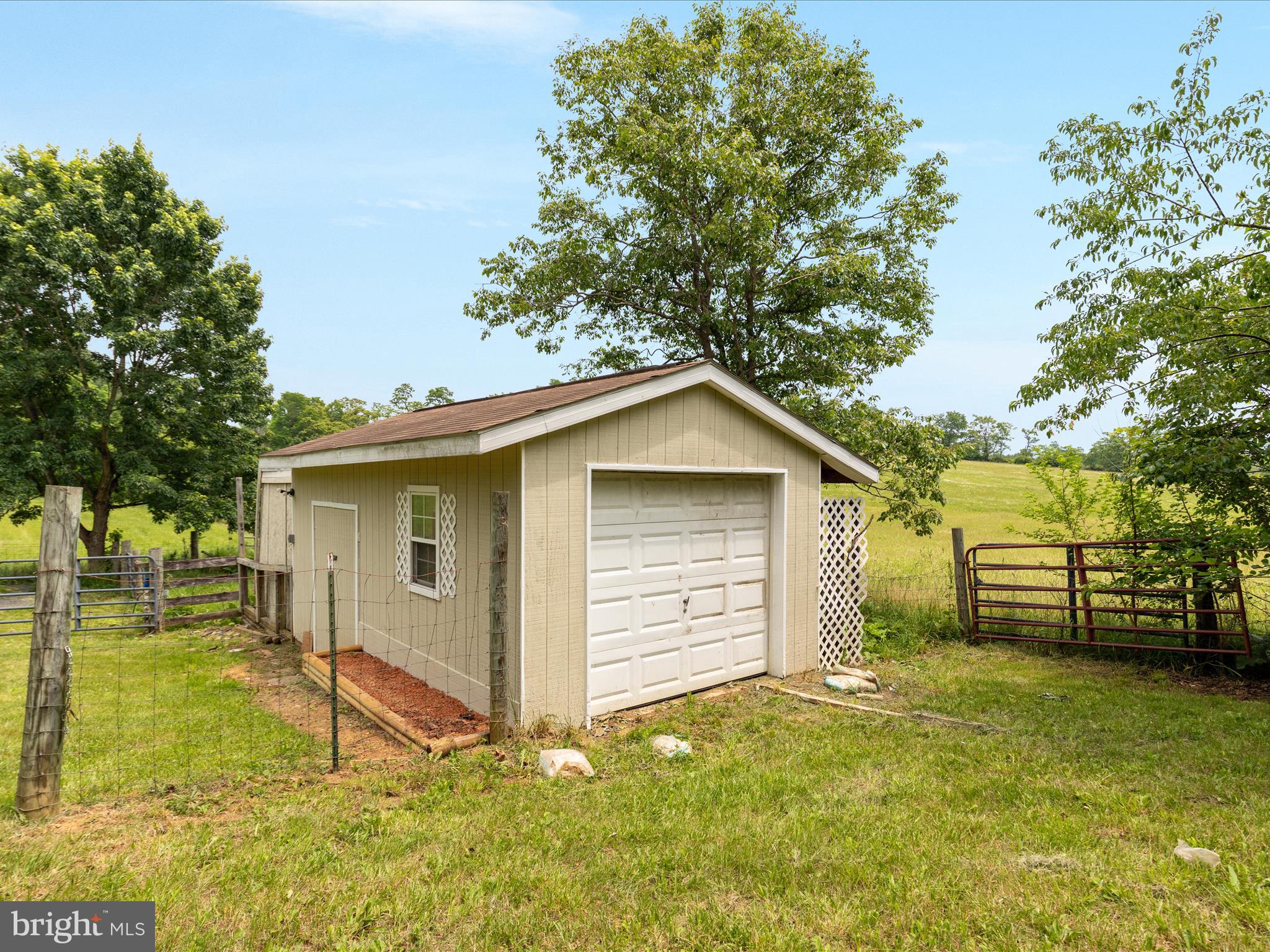 13970 Back Road Strasburg, VA 22657 - Photo 34 of 68 a view of a house with a yard