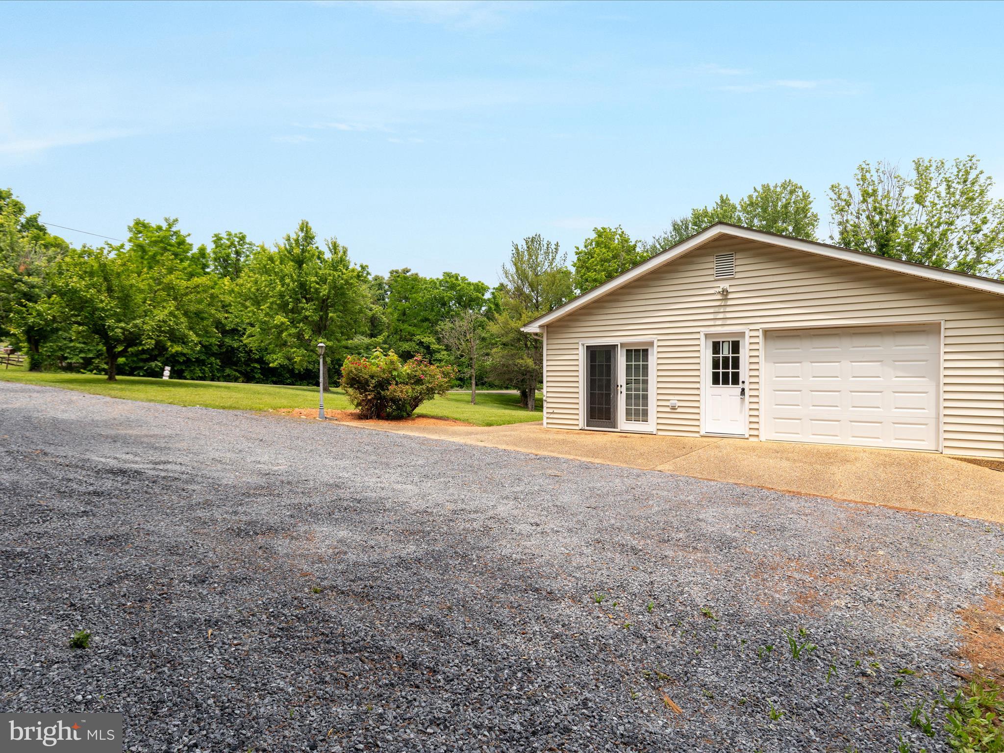13970 Back Road Strasburg, VA 22657 - Photo 37 of 68 a house with trees in the background