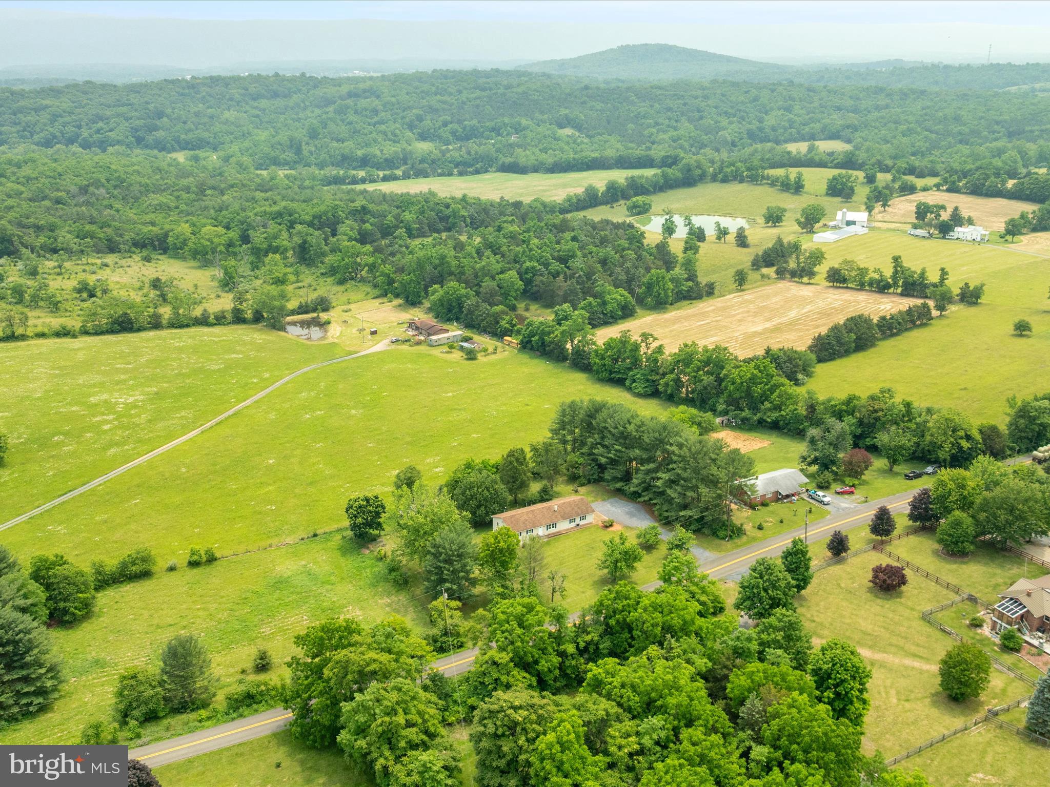 13970 Back Road Strasburg, VA 22657 - Photo 42 of 68 a view of a lake with a yard