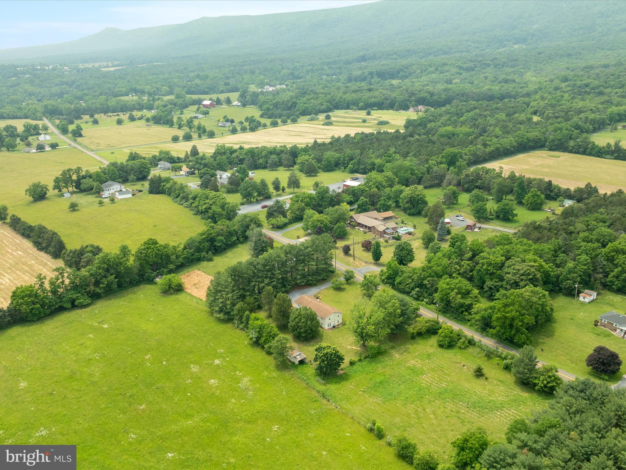 13970 Back Road Strasburg, VA 22657 - Photo 43 of 68 a view of a lake with a houses