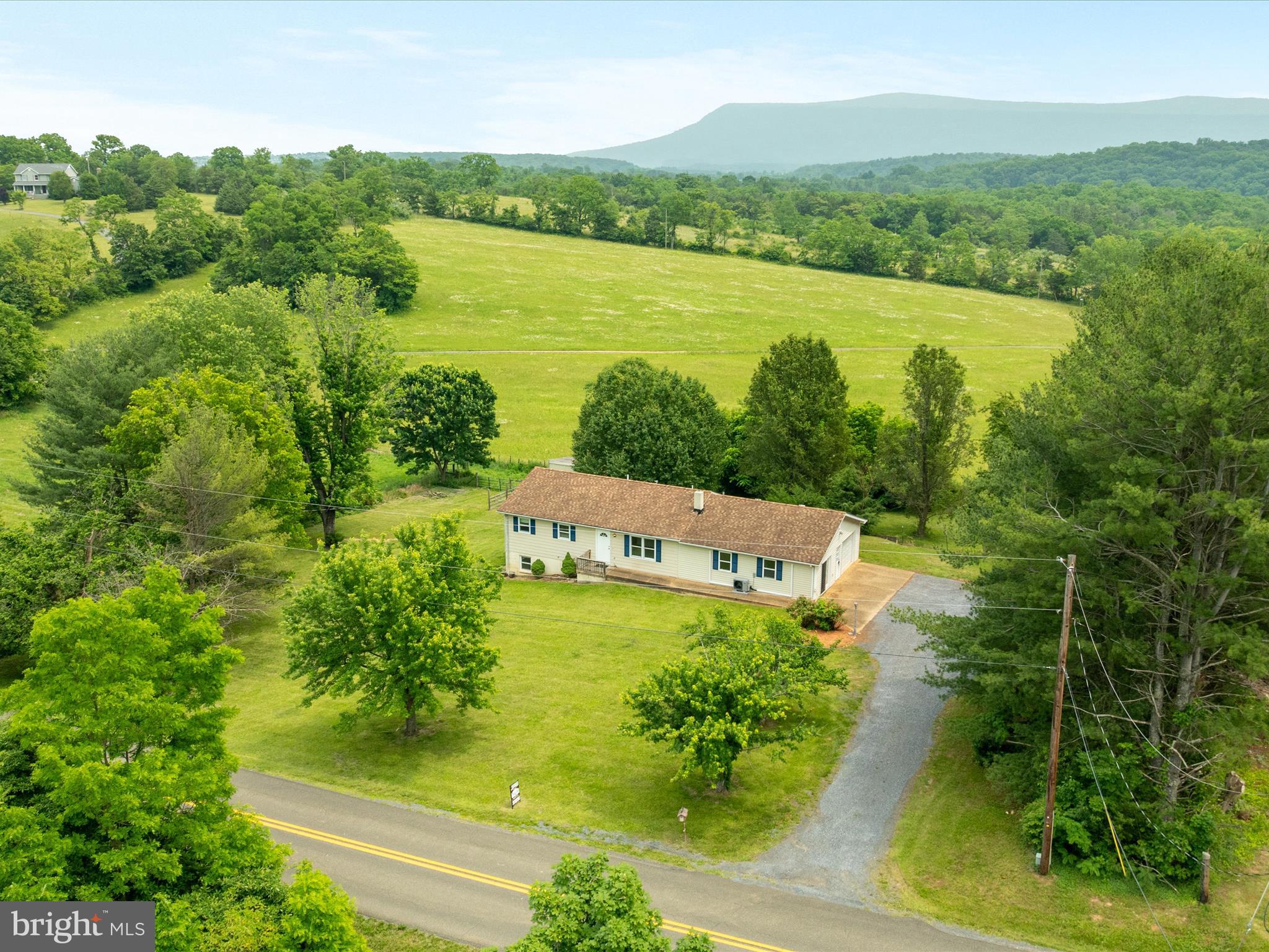 13970 Back Road Strasburg, VA 22657 - Photo 49 of 68 a view of a lake with a mountain view