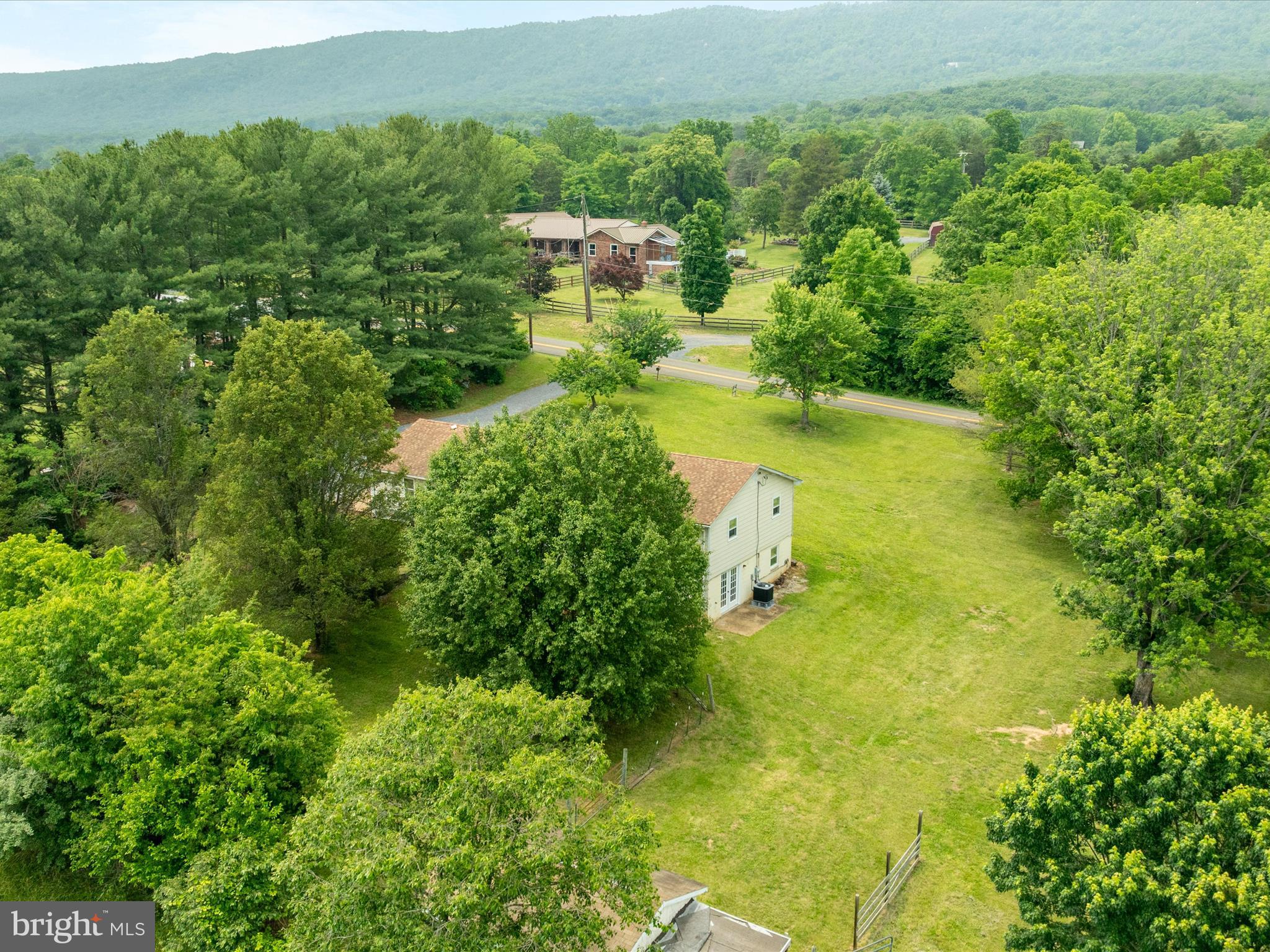 13970 Back Road Strasburg, VA 22657 - Photo 52 of 68 an aerial view of residential houses with outdoor space and trees all around