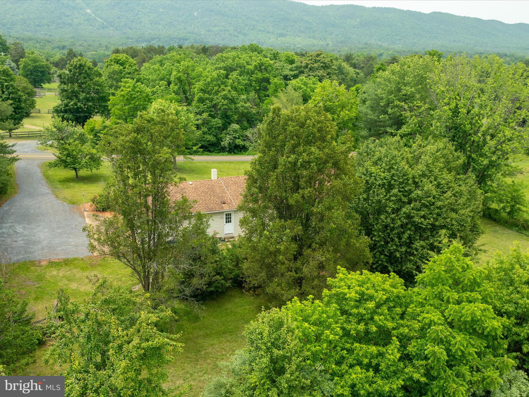 13970 Back Road Strasburg, VA 22657 - Photo 54 of 68 a view of a lake with a field