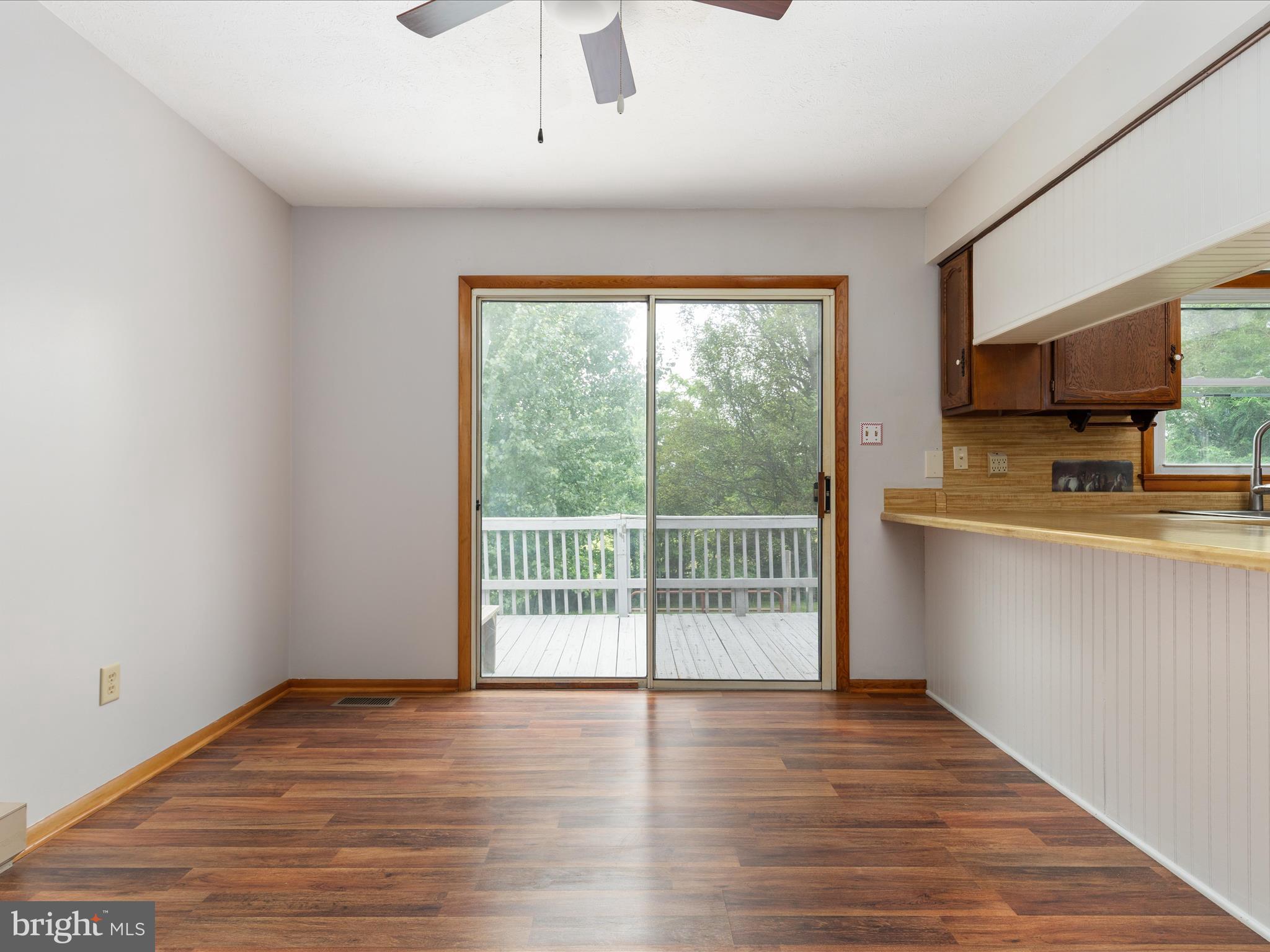 13970 Back Road Strasburg, VA 22657 - Photo 8 of 68 a view of a kitchen with wooden floor and a sink