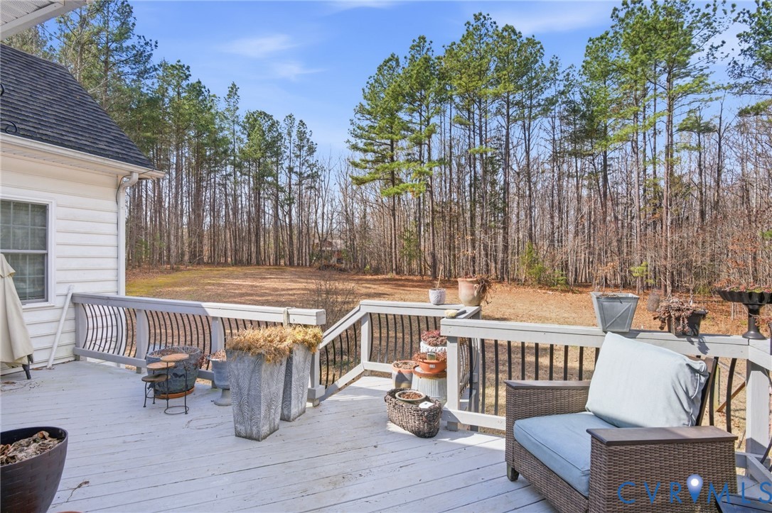 6109 Autumn Bluff Road Powhatan, VA 23139 - Photo 24 of 28 a view of a chairs and table on the wooden floor