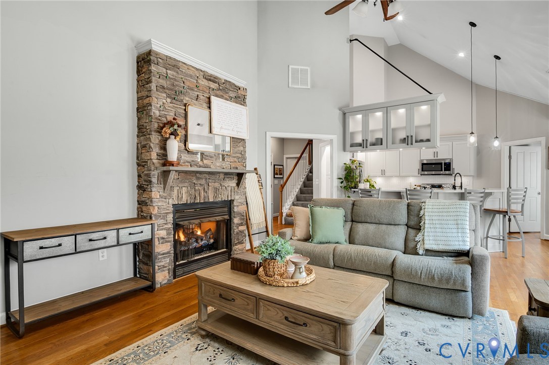 6109 Autumn Bluff Road Powhatan, VA 23139 - Photo 5 of 28 a living room with furniture and a fireplace