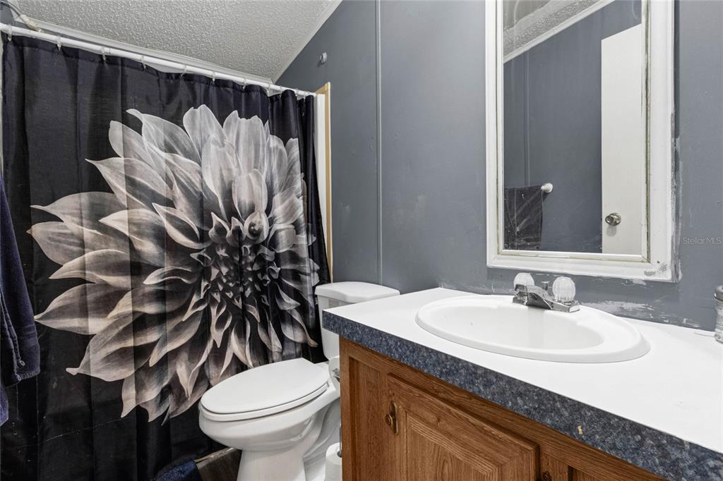 975 Spring Court Frostproof, FL 33843 - Photo 16 of 35 Guest Bathroom