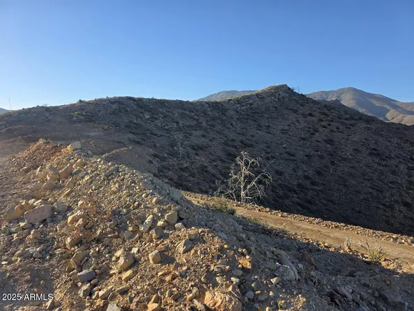 a view of mountains and valleys