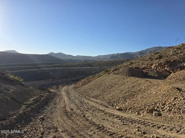 a view of mountain view with mountains in the background
