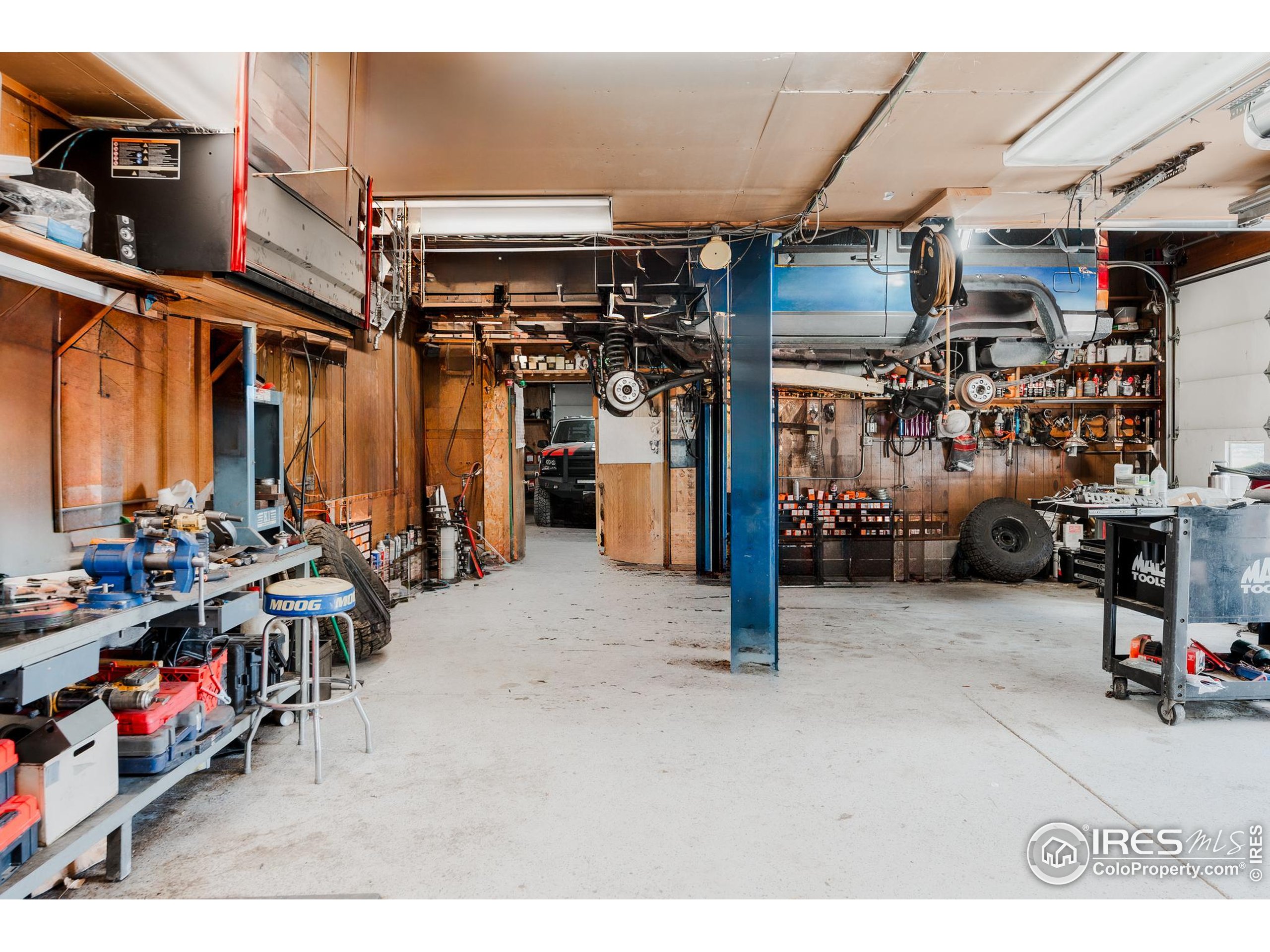 6789 Niwot Road Longmont, CO 80503 - Photo 24 of 28 a view of a garage with storage