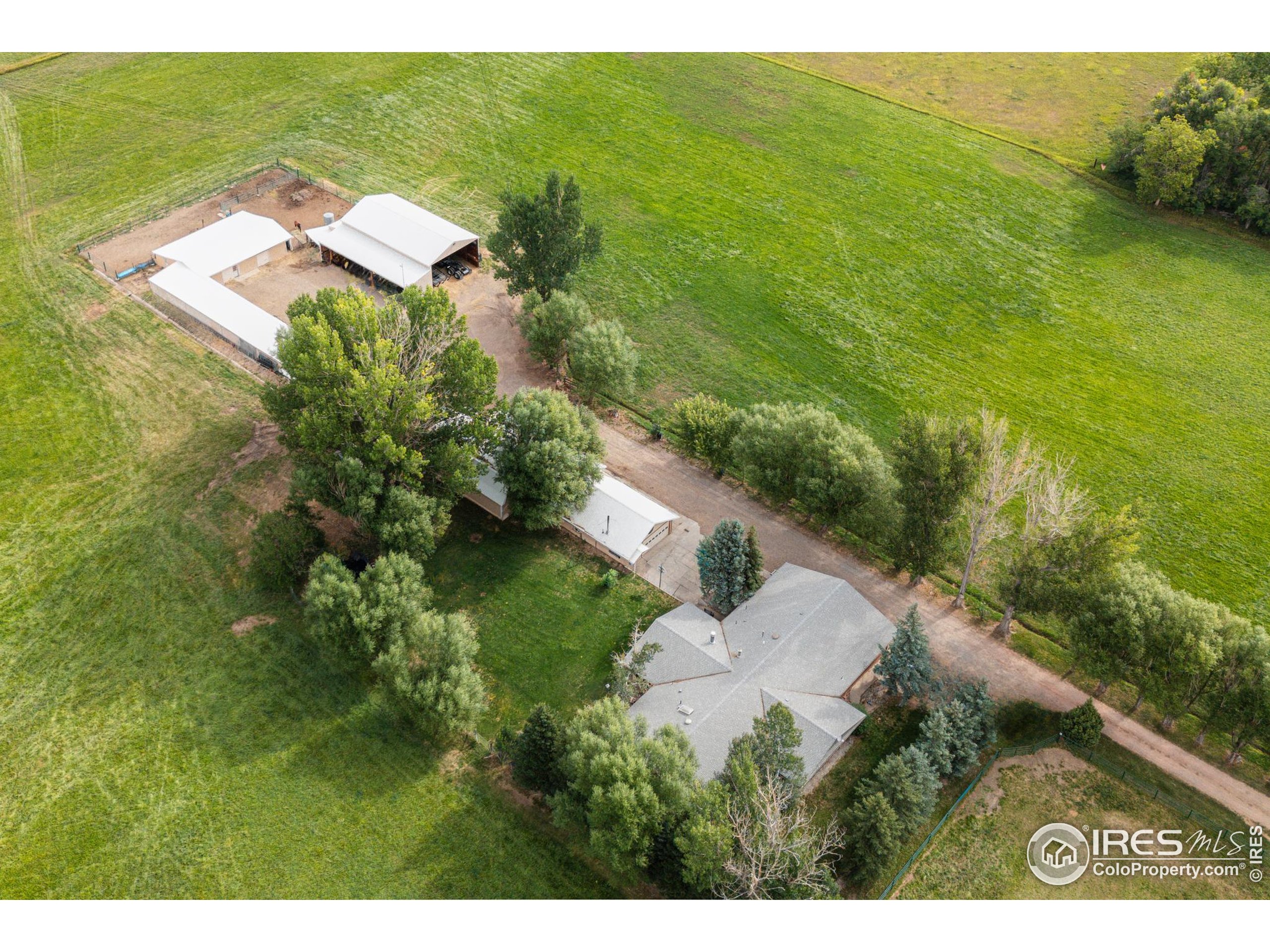 6789 Niwot Road Longmont, CO 80503 - Photo 9 of 28 a aerial view of a house with a yard