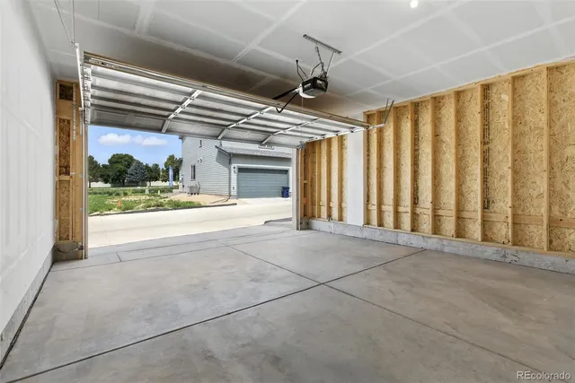 a view of a house with a garage