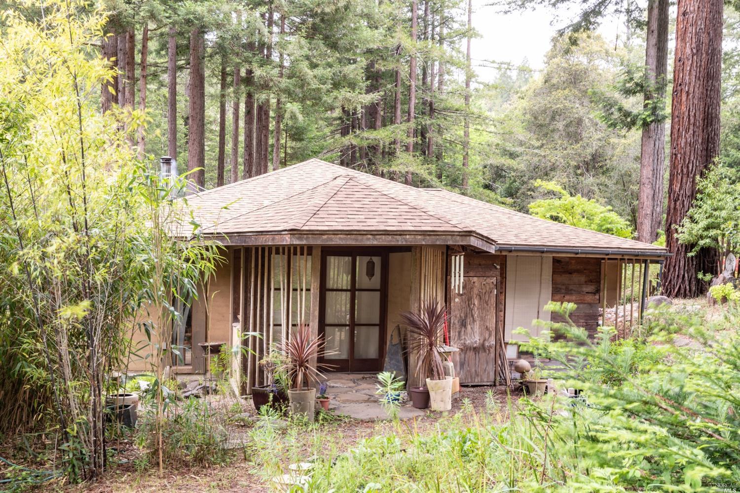 a backyard of a house with seating space