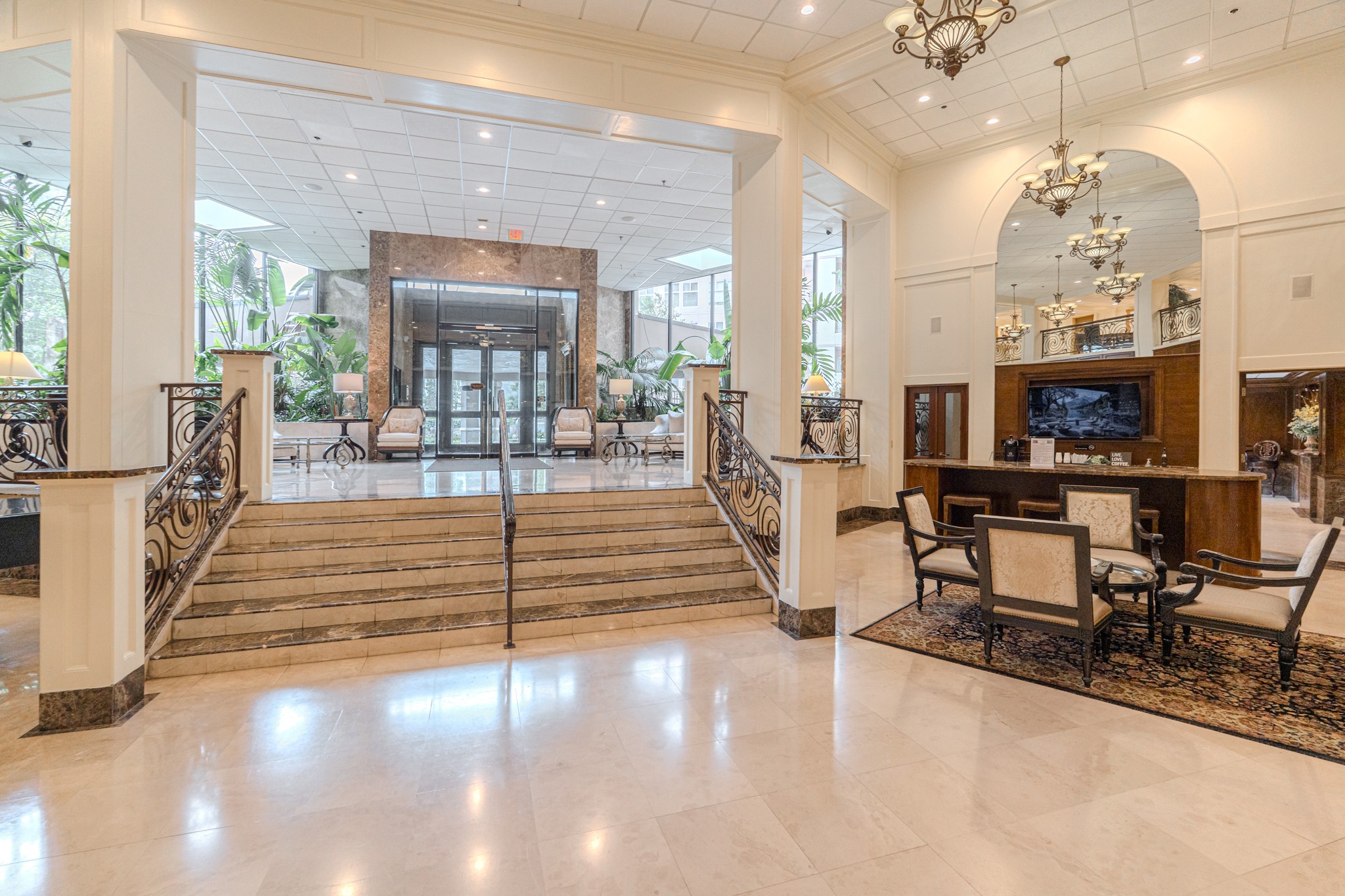 3525 Sage Road, Unit 1016 Houston, TX 77056 - Photo 11 of 42 a view of a living room and chandelier in the back