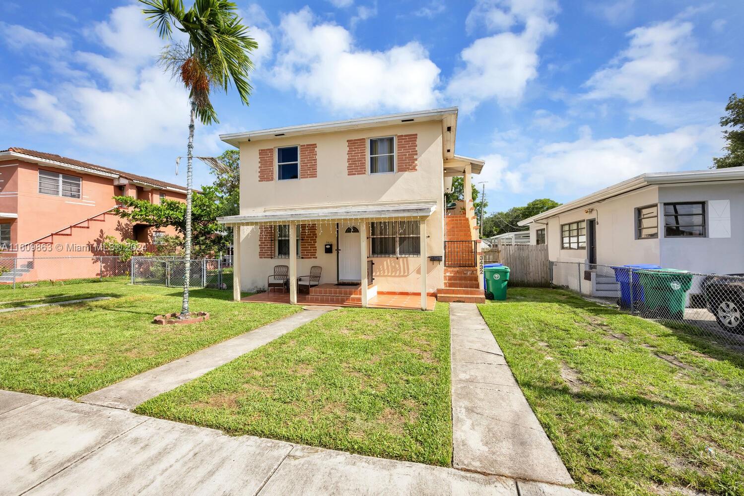 3430 Southwest 11th Street Miami, FL 33135 - Photo 1 of 21 a view of a house with a yard patio and swimming pool