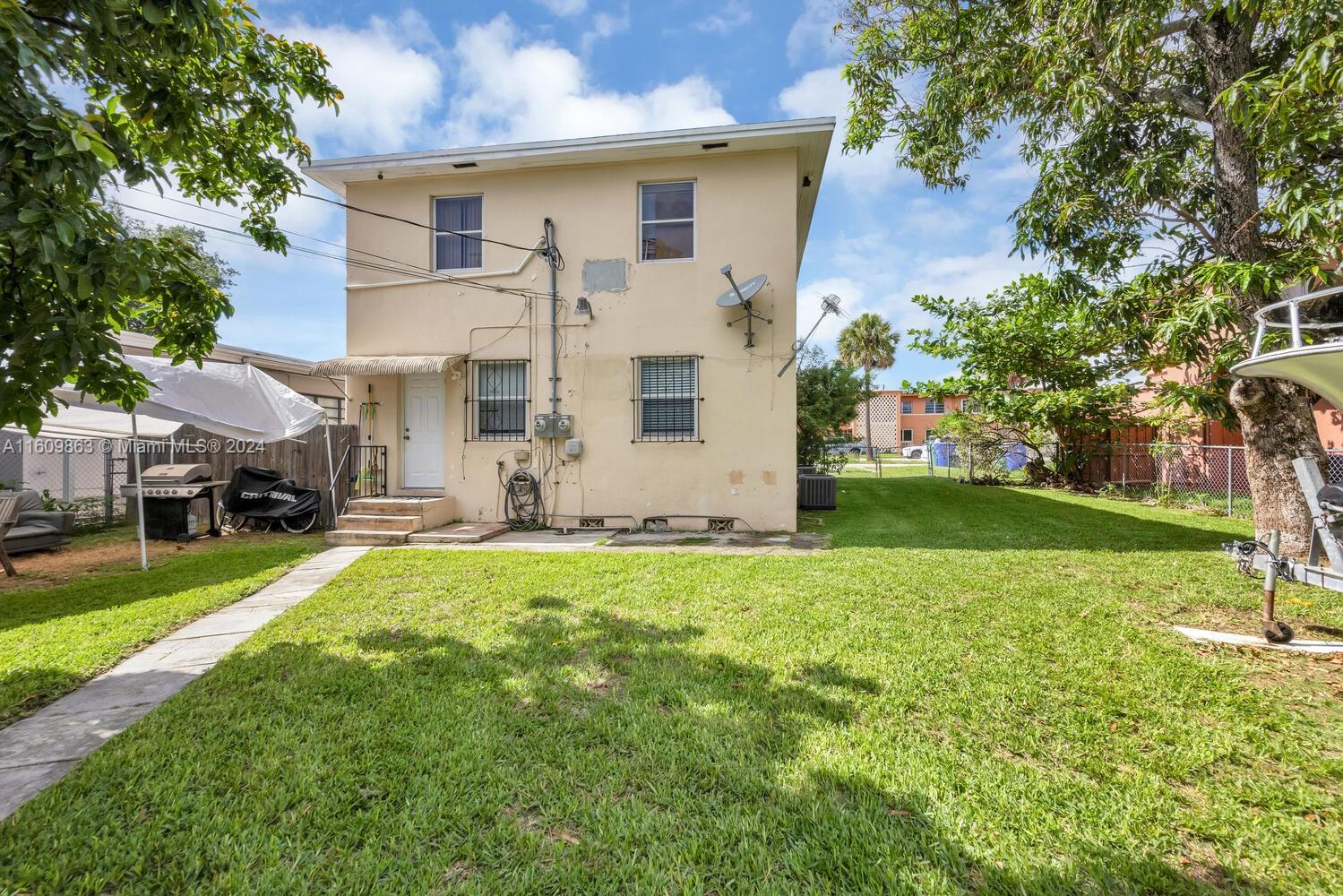 3430 Southwest 11th Street Miami, FL 33135 - Photo 20 of 21 a view of a house with backyard