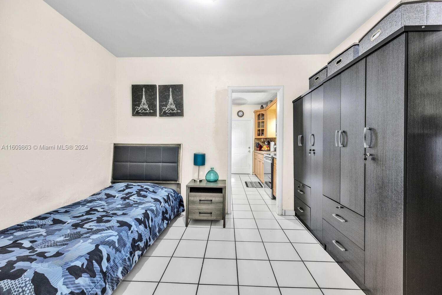 3430 Southwest 11th Street Miami, FL 33135 - Photo 4 of 21 a room with a bed and a view of bathroom