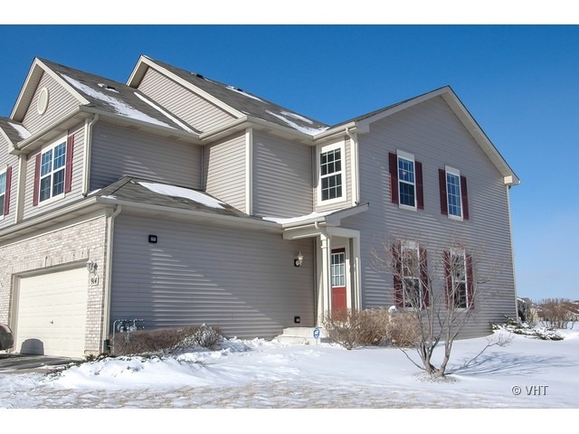 914 Oak Ridge Boulevard Elgin, IL 60120 - Photo 1 of 15 a front view of a house with a yard