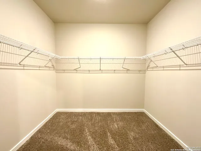 a view of a room with an empty space