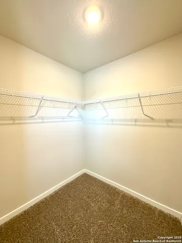 a view of a room with an empty space