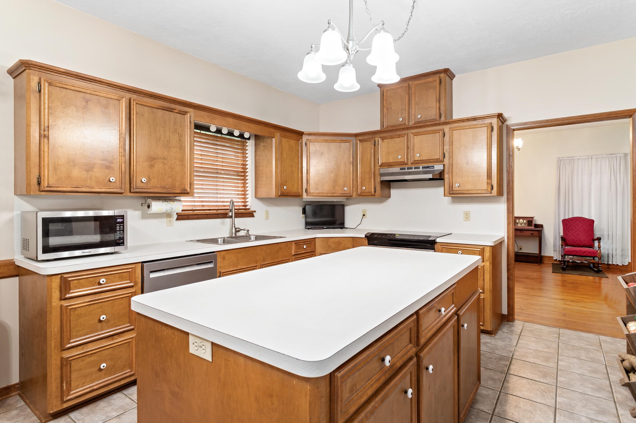 3084 Highway 63 Jasper, TX 75951 - Photo 15 of 44 a kitchen with a stove a sink and a refrigerator