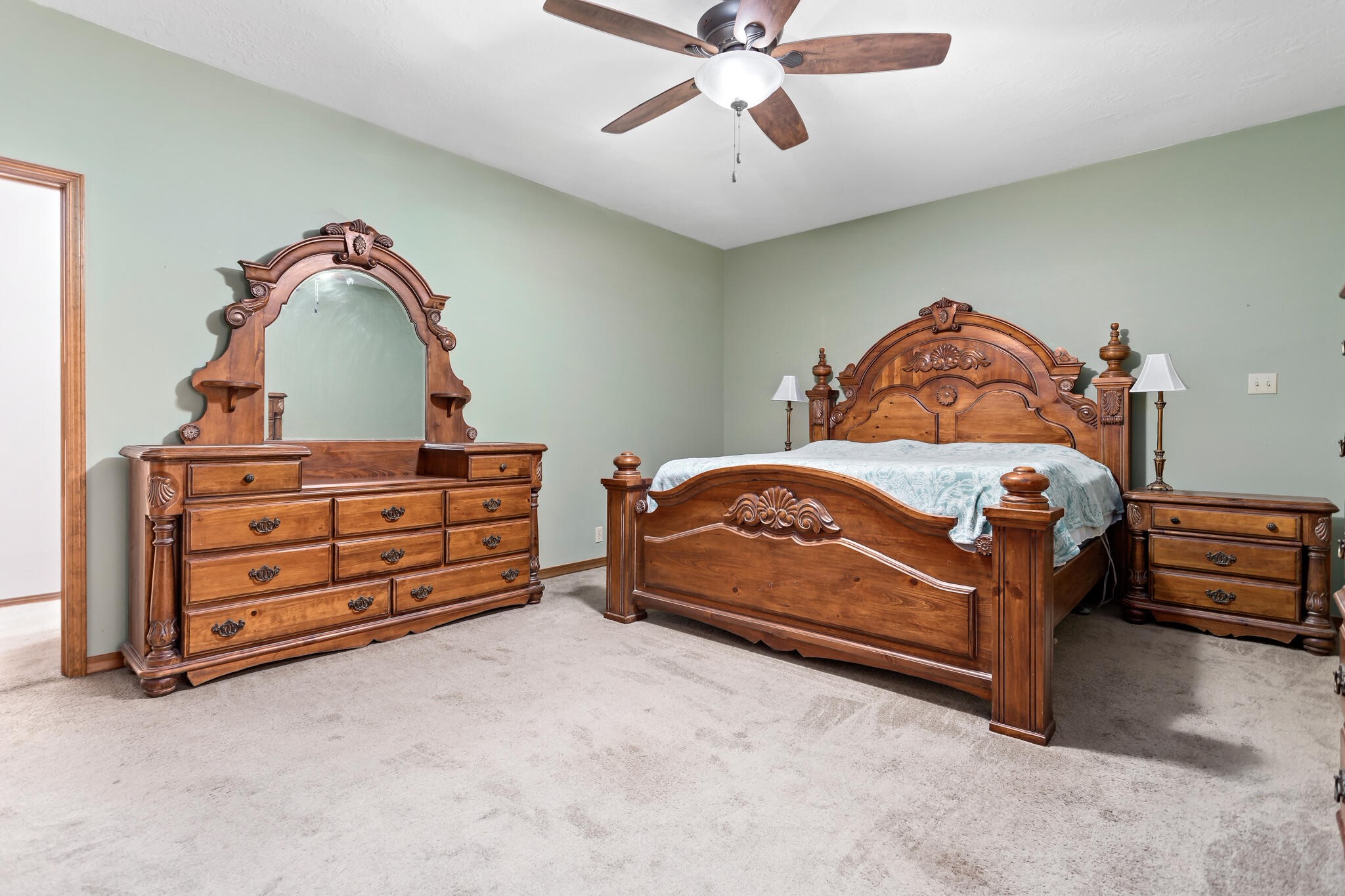 3084 Highway 63 Jasper, TX 75951 - Photo 21 of 44 a bedroom with a bed and a dresser