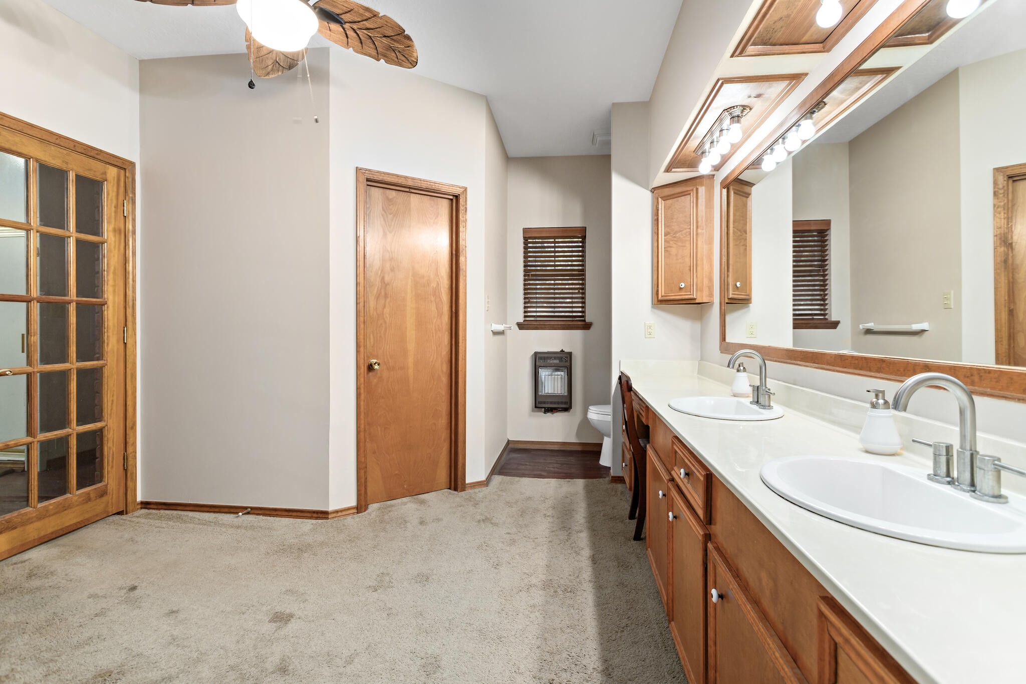 3084 Highway 63 Jasper, TX 75951 - Photo 22 of 44 a bathroom with a sink a toilet and shower