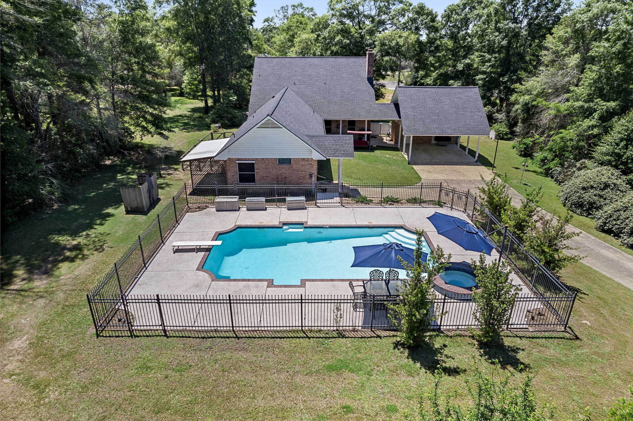 3084 Highway 63 Jasper, TX 75951 - Photo 36 of 44 a view of a house with a yard