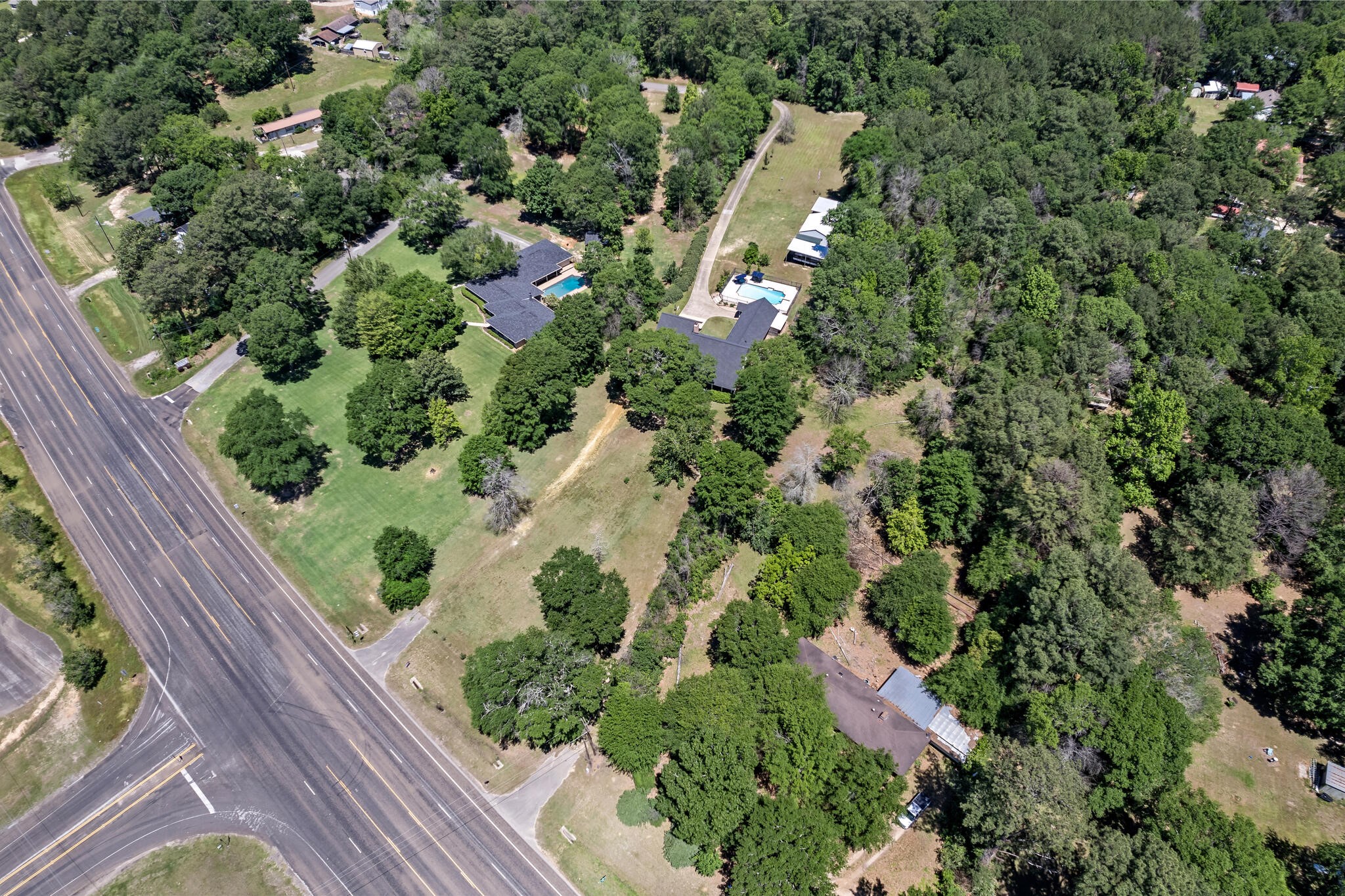 3084 Highway 63 Jasper, TX 75951 - Photo 41 of 44 an aerial view of a house with a yard