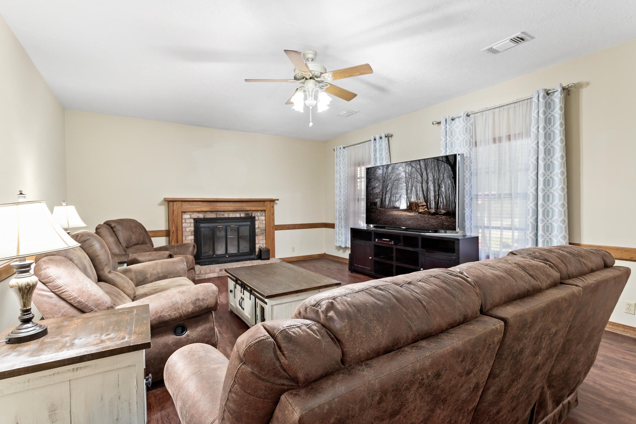 3084 Highway 63 Jasper, TX 75951 - Photo 8 of 44 a living room with furniture and a fireplace