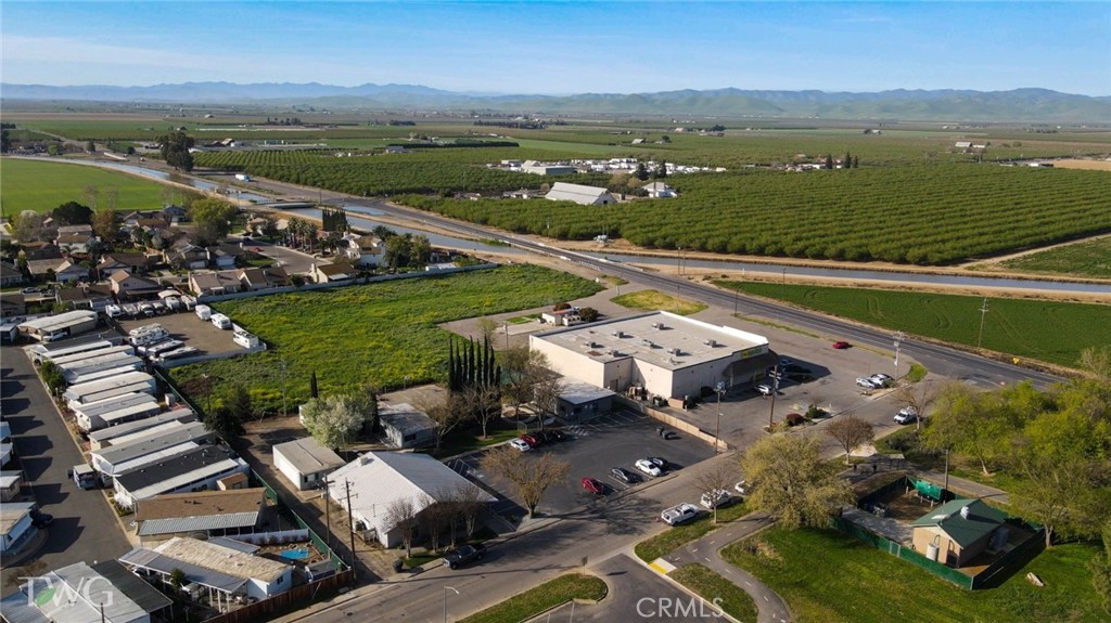 0 Santa Nella Boulevard Gustine, CA 95322 - Photo 6 of 12 an aerial view of a city with lake view