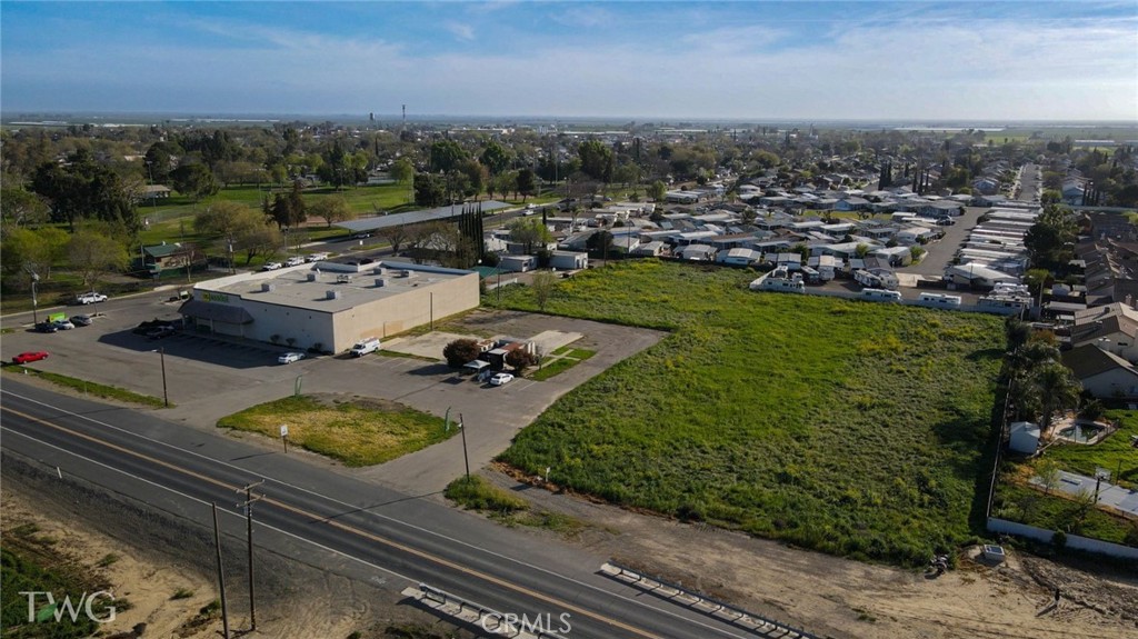 0 Santa Nella Boulevard Gustine, CA 95322 - Photo 7 of 12 an aerial view of a house with yard basket ball court and outdoor seating