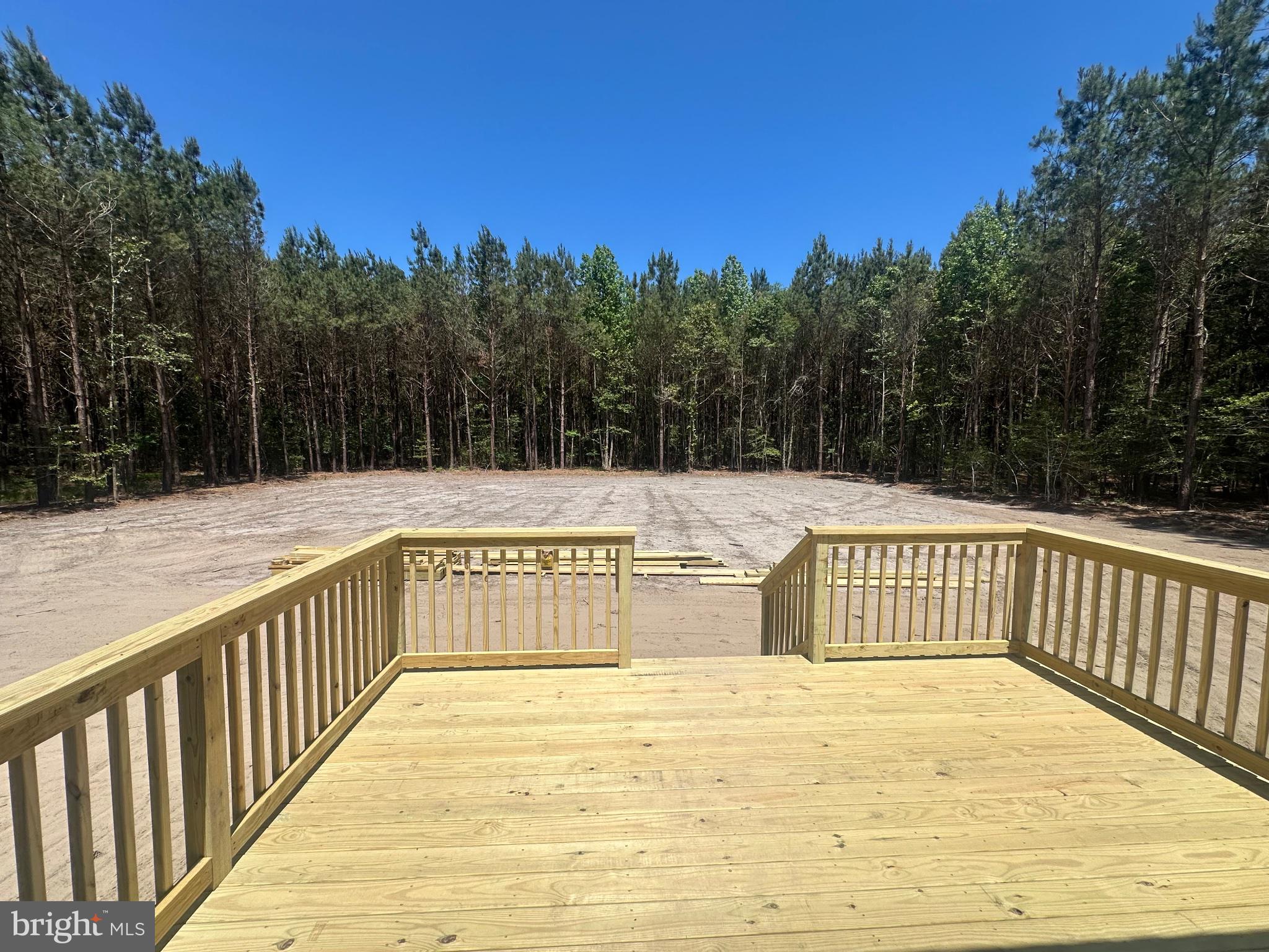 18901 Asketum Branch Road Georgetown, DE 19947 - Photo 8 of 10 Serene deck overlooking lush woods.