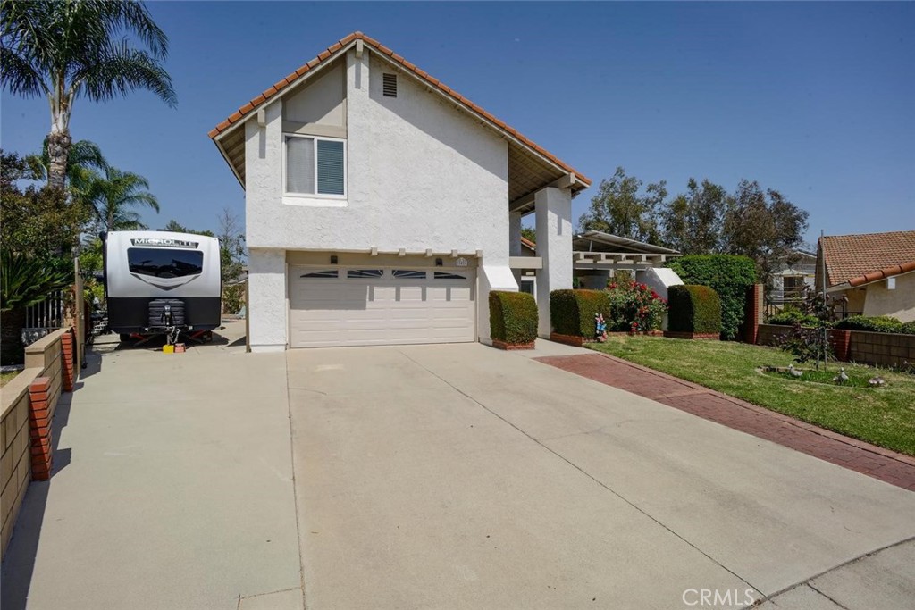 10424 Cartilla Court Rancho Cucamonga, CA 91737 - Photo 2 of 36 a view of house with a outdoor space