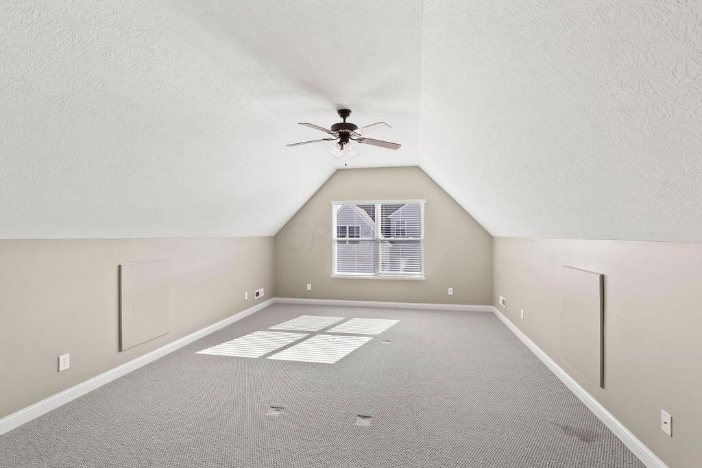 6163 Jennis Road Westerville, OH 43081 - Photo 29 of 44 • Sunken
• Tan carpet
• Tan painted walls
• Angled ceiling
• Lighted ceiling fan
• Attic access
• 2” blinds