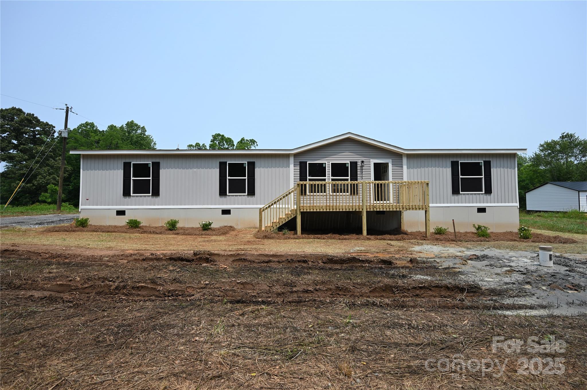 1213 Renno Road Clinton, SC 29325 - Photo 1 of 17 a front view of a house with a yard