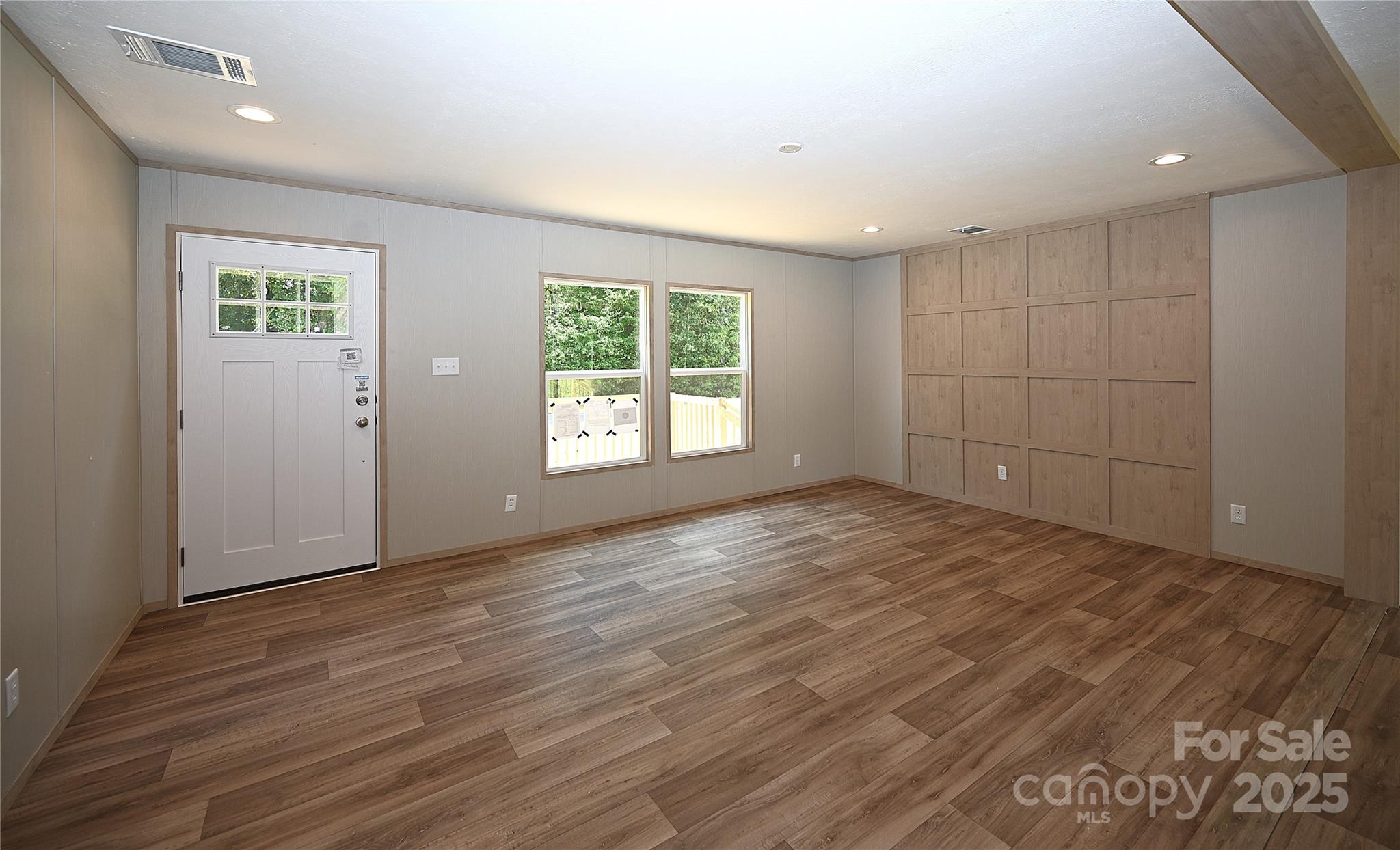 1213 Renno Road Clinton, SC 29325 - Photo 3 of 17 an empty room with windows and closet